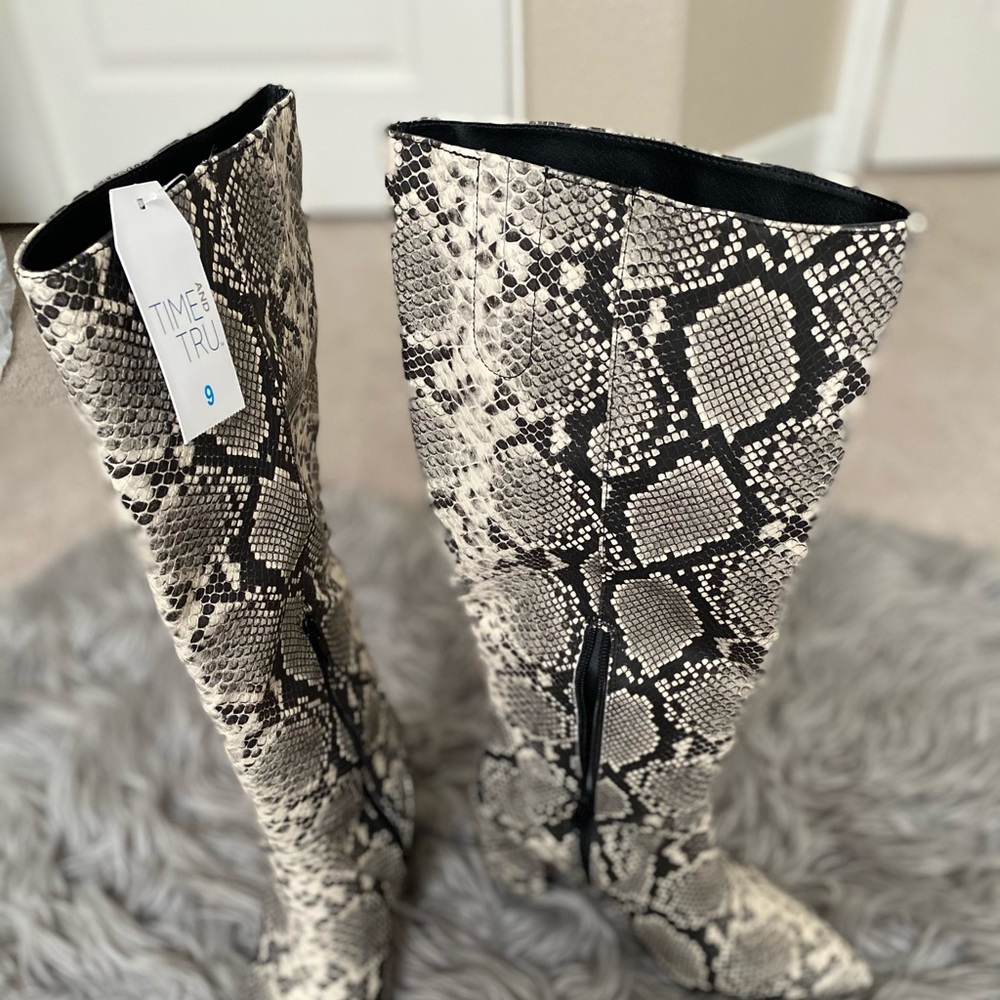 Knee high snake print boots